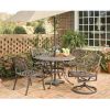 42-inch Round Patio Dining Table in Rust Brown Metal with Umbrella Hole